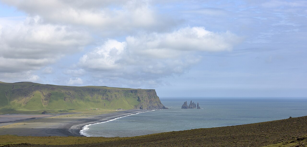 Reynisdrangar sea stacks off Iceland's south coast, tied to troll legends in local folklore